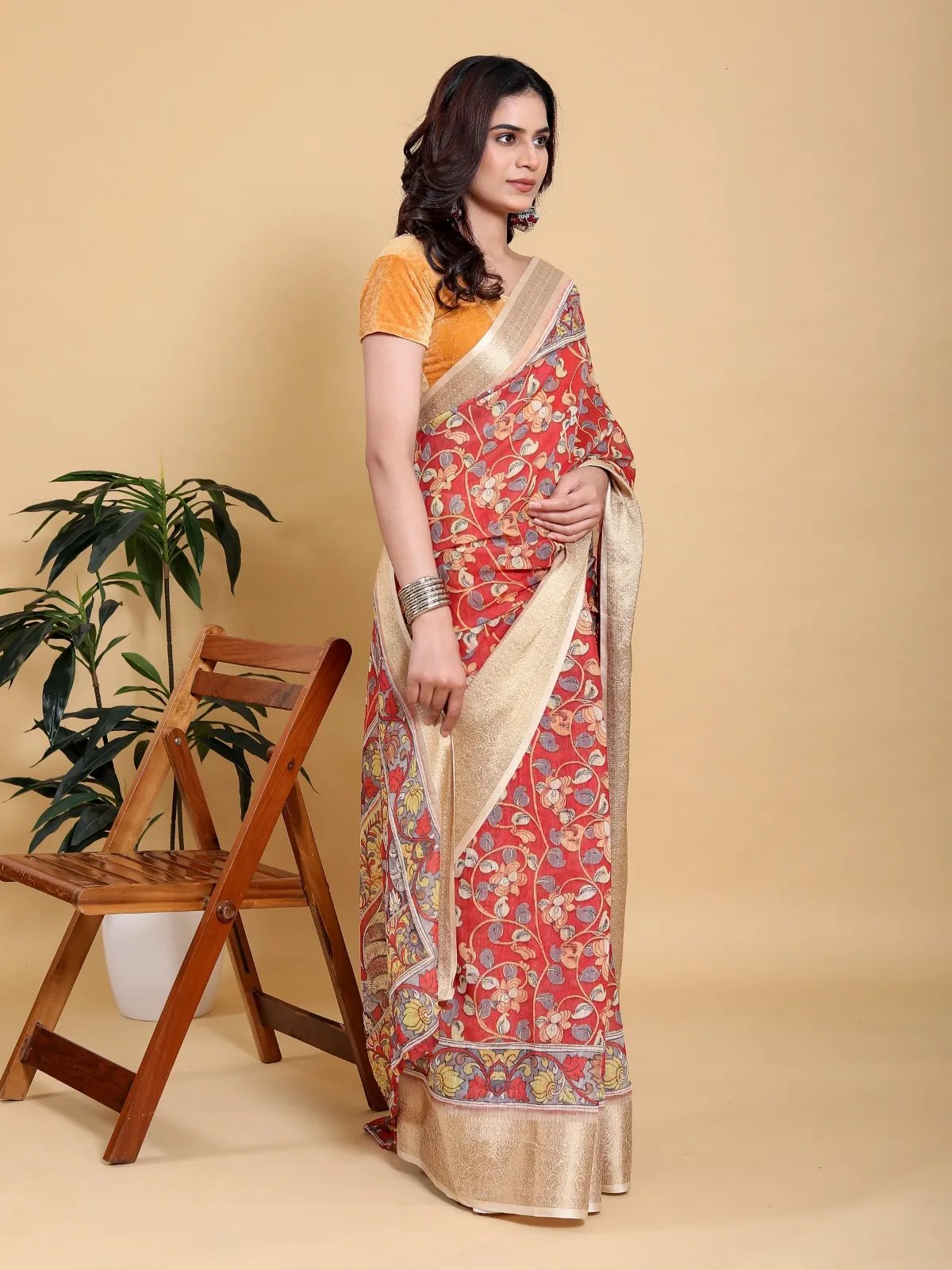 Vibrant Red Kalamkari Print Saree with Gold Zari Border in Kolkata