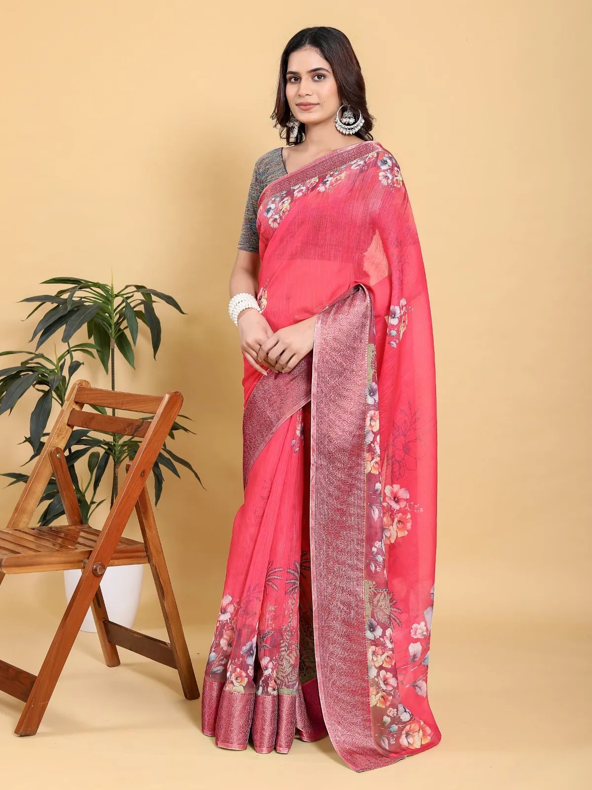 Rani Pink Floral Saree with Contrast Green Zari Border in Kolkata